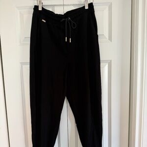 Lune Active black breathable black  jogger pants with gold hardware. Size M.